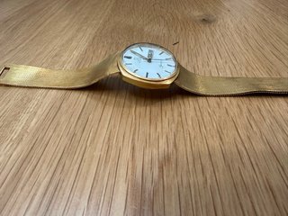 Reloj Omega automático de oro