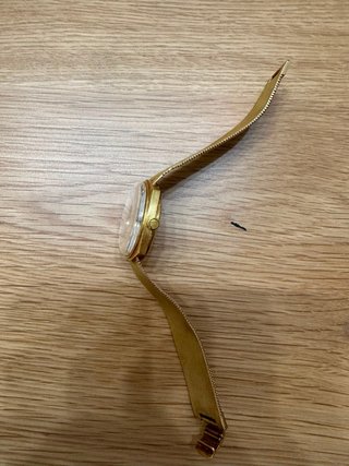 Reloj Omega automático de oro
