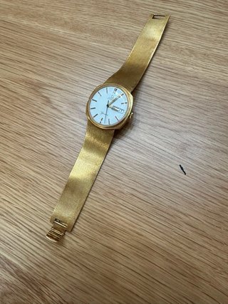 Reloj Omega automático de oro