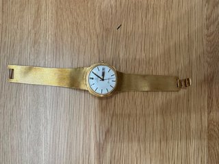 Reloj Omega automático de oro