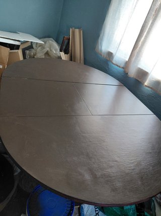 Mesa de jantar extensível em madeira