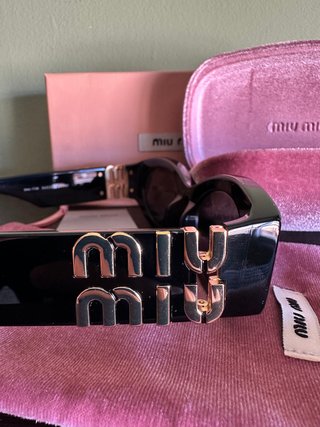 Gafas Miu Miu Cat Eye Negras y Doradas
