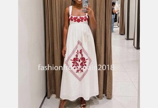 Vestido blanco con bordado rojo