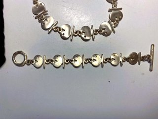 Conjunto collar y pulsera peces plateados