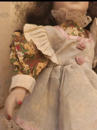 Muñeca de porcelana antigua