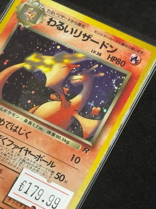 Charizard Oscuro (ROG) Swirl Carta Pokémon
