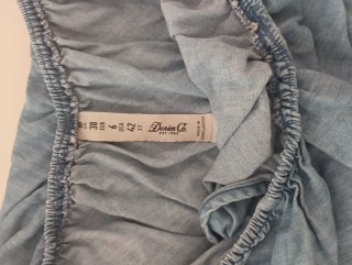 Vestido vaquero corto con volantes