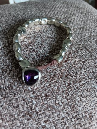Pulsera de acero con piedra morada