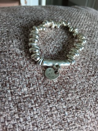Pulsera de acero con charm