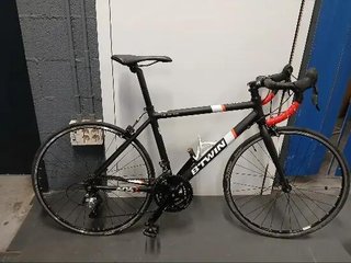 BTWIN BICICLETA CARRETERA TRIBAN 500 NEGRO/BLANCO/NARANJA