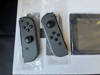 Nintendo Switch + FIFA 23 Legacy Edition
