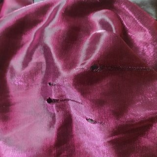 Tessuto cangiante fucsia fallato