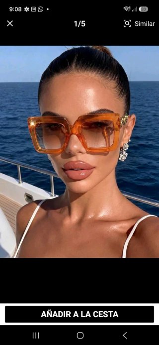 Gafas de sol naranjas y doradas