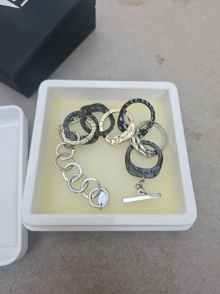 Bracciale Lotus con maglie irregolari in argento e nero