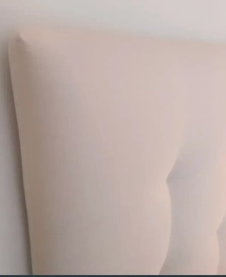Cabecero tapizado beige para camas de 135 cm