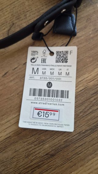 Bolso Stradivarius negro con pedrería