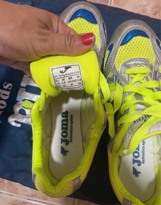 Zapatillas atletismo Joma clavos plateado/amarillo