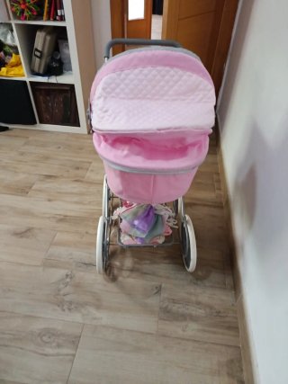 Cochecito de muñecas rosa