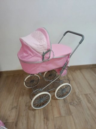 Cochecito de muñecas rosa