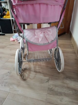 Cochecito de muñecas rosa