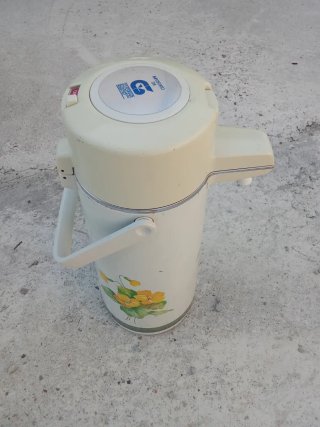Brocca termica beige con fiori