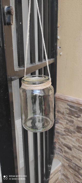 Tarro decorativo de cristal con cuerda
