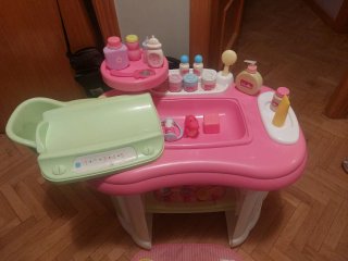 Cambiador de muñecas con accesorios marca mimitos