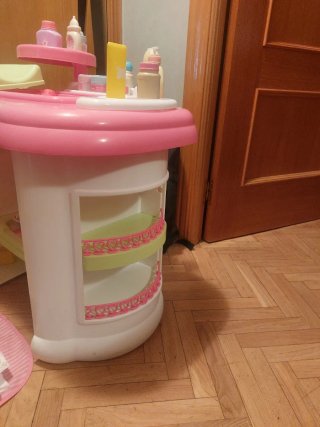 Cambiador de muñecas con accesorios marca mimitos