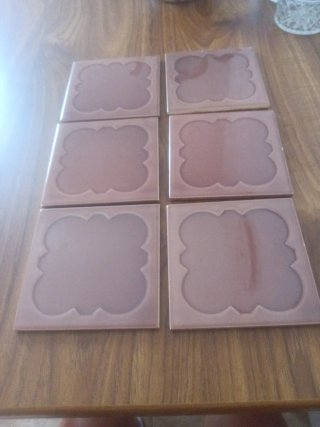 Seis posavasos de cerámica marrones