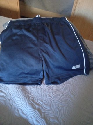 Pantalones cortos Joma azules y negros 8 años