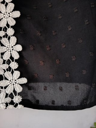 Top negro Giesswein talla XL con flores