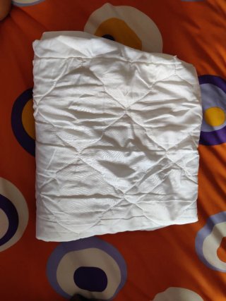 Protector de colchón cuna blanco