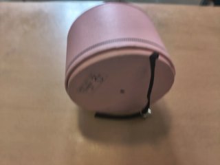 Caja Tous rosa con cinta negra y charm