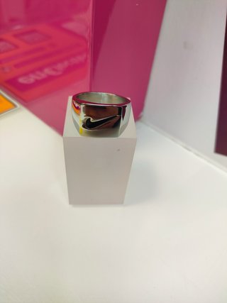 Anillo acero plateado con simbolo de nike T25