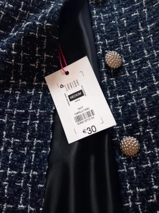 Chaqueta tweed elegante