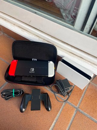 Nintendo Switch OLED + Funda + 2 Juegos