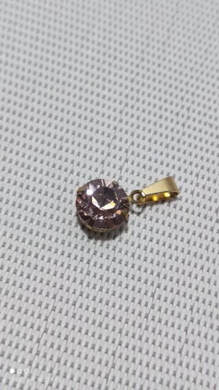 Colgante Swarovski de Latón y Acero inoxidable.