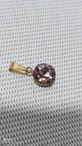 Colgante Swarovski de Latón y Acero inoxidable.