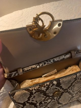 Bolso tous ,desgaste del Roce en la bandolera