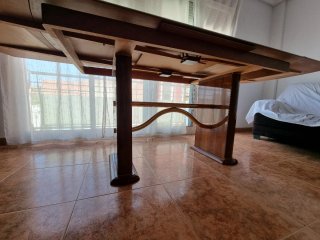 Mesa de comedor extensible de madera