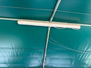 Carpa de sombra verde y blanca camping Camell.