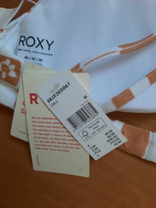 Sujetador bikini Roxy blanco y marrón claro.