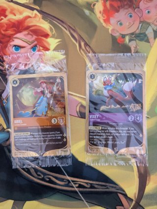 Cartas Promo Lorcana Selladas Ariel y Vixey