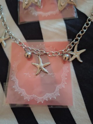 Conjunto pendientes y pulsera estrella de mar