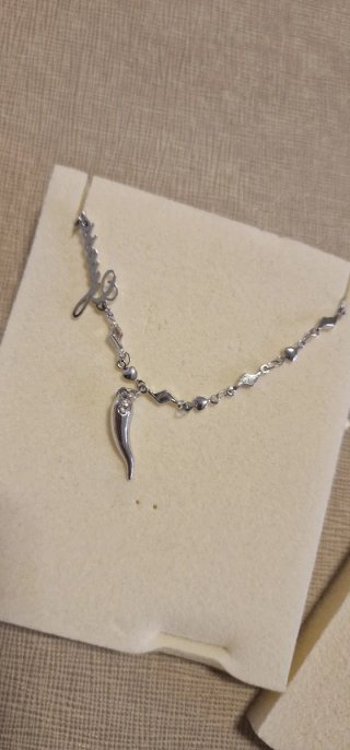 Parure Guess collana, bracciale e orecchini