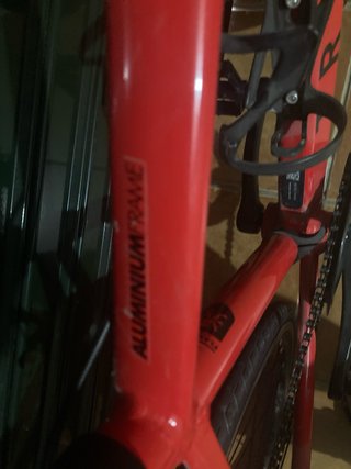Bicicleta de carretera Triban roja niños +1,30cm