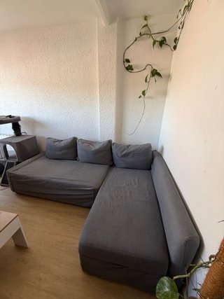 Sofá cama 3 plazas gris.