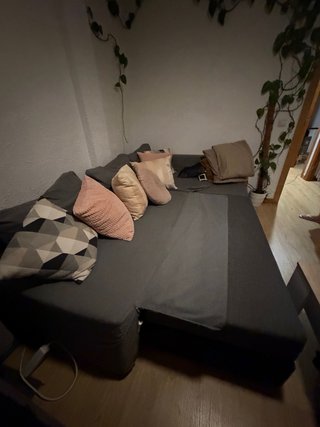 Sofá cama 3 plazas gris.