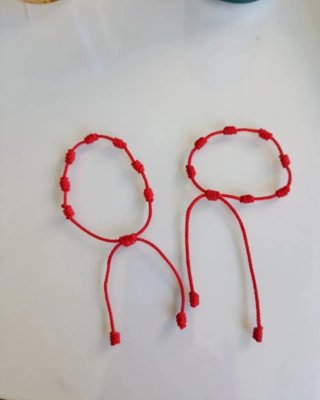 Pulsera 7 nudos roja ajustable