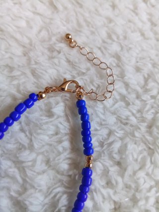 Pulsera concha azul y dorada